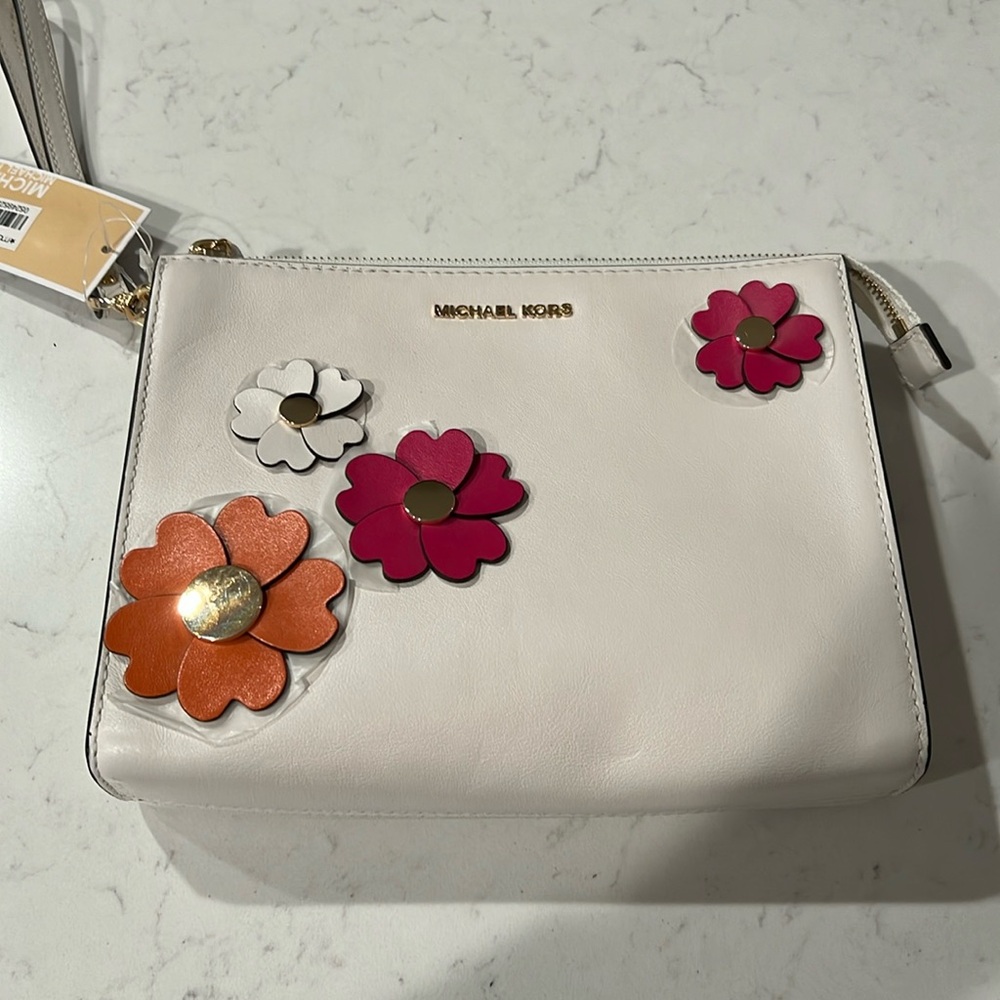 Michael Kors clutched purse.